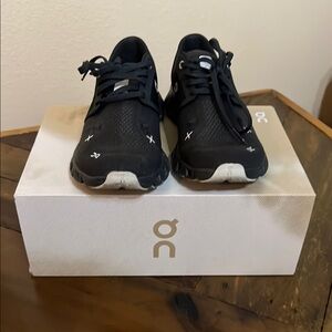 On Running Black and White Athletic Shoes